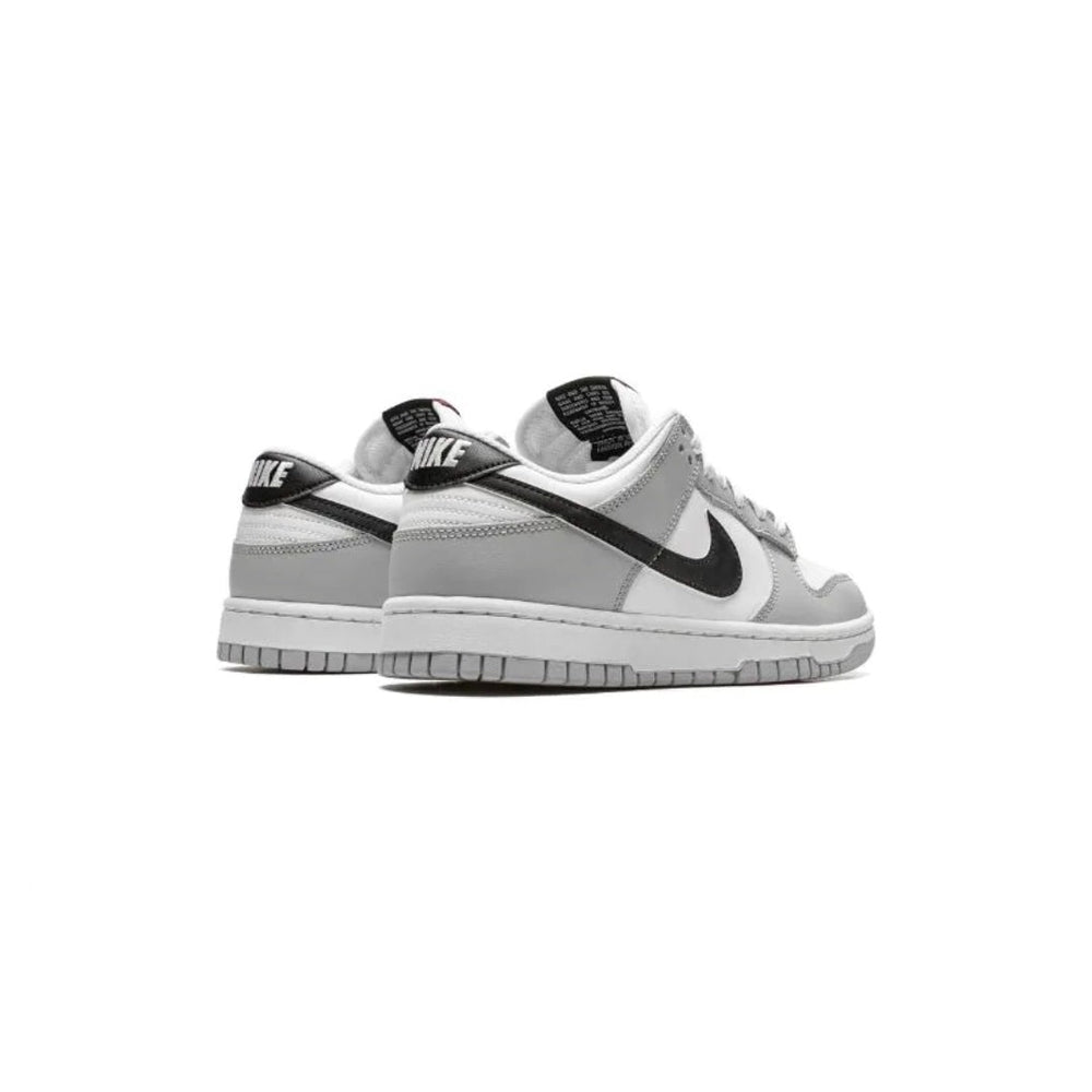 
                      
                        DUNK LOW SE SNEAKERS
                      
                    